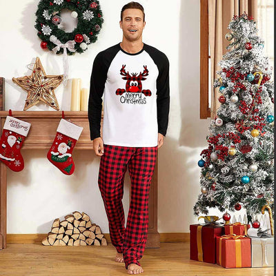Matching family Christmas pajamas with red and black buffalo plaid pants and white tops featuring a reindeer graphic. - Image 8