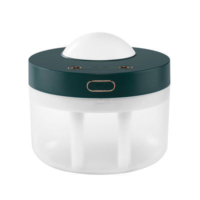White portable projection humidifier with a translucent water tank and gold-accented control buttons. - Image 8