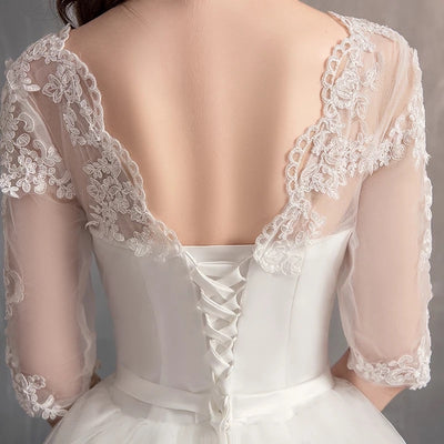Vestido de Novia con Manga Larga y Cola Elegante - Image 12