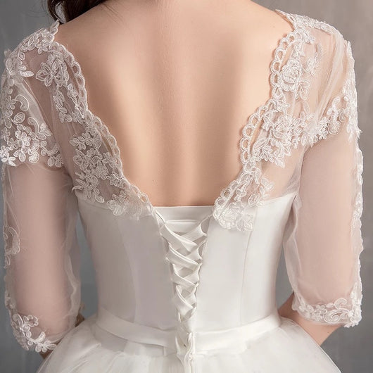 Vestido de Novia con Manga Larga y Cola Elegante - Image 12