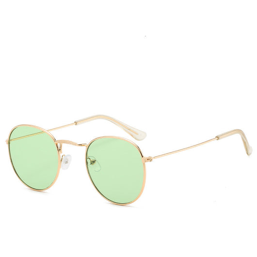 Round gold-framed sunglasses with pink tinted lenses, featuring clear temple tips. - Image 8