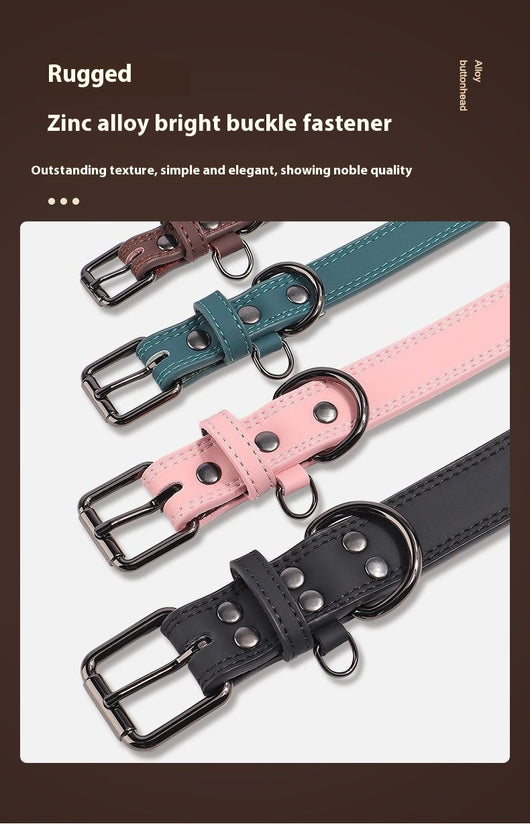 Teal leather pet collar with white stitching, dark metal buckle, and D-ring, displayed on a brown surface. - Image 13