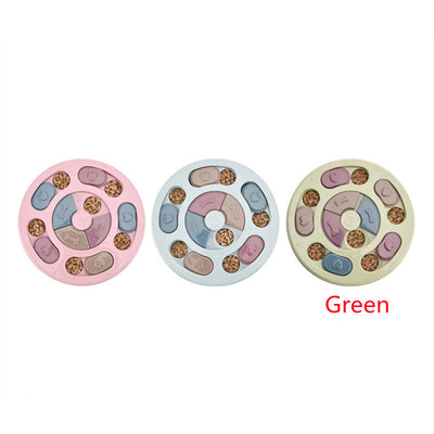 Paw-shaped dog puzzle feeder toy in light yellow with colorful sliding covers, filled with kibble. - Image 11