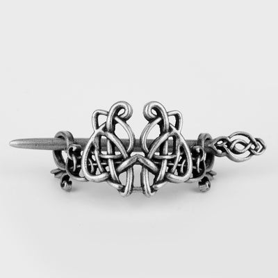 Silver metal hair clip with a retro dragon head and infinity knot design, secured by a plug-in hairpin. - Image 12