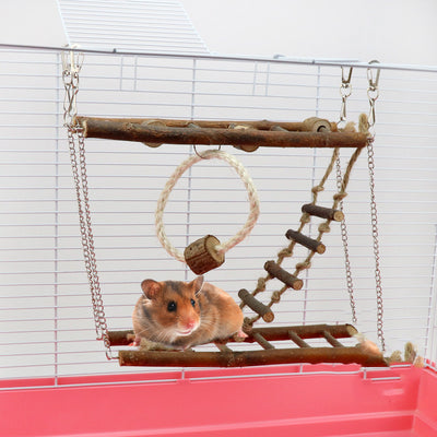 Wooden suspension bridge and ladder climbing toy for small pets, made of natural branches and jute rope, hanging in a cage.