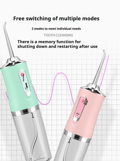 Pink portable electric oral irrigator with clear water tank and four nozzles, highlighting adjustable pressure and pulse mode. - Image 14