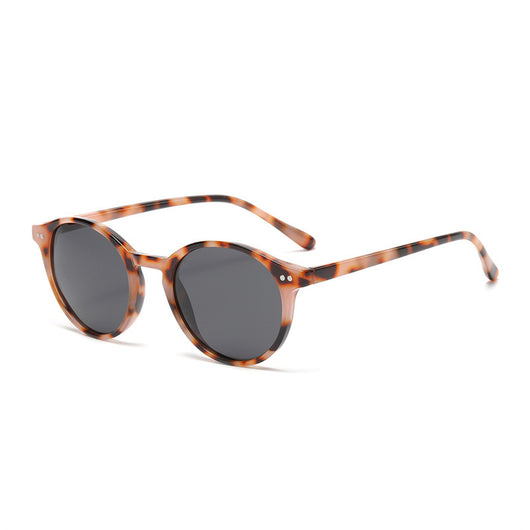 Round black full-rim sunglasses with vibrant blue polarized lenses, ideal for sun protection and fashion. - Image 12