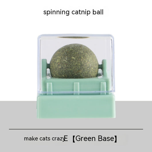 Two spinning catnip balls, one with a green base and one with a blue base, in clear plastic cases. - Image 2