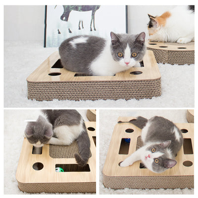 Round corrugated cardboard cat scratcher with a central scratching pad and multiple holes containing colorful balls. - Image 3