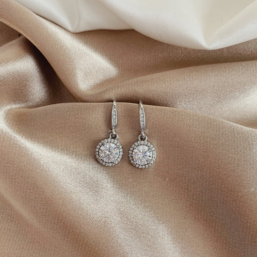 Aretes Moissanita Redondos de Cuatro Puntas - Image 14