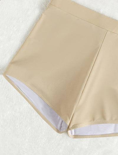 Women's deep-V Halong Bay-style two-piece swimsuit in light beige, featuring a crop top and high-waisted shorts. - Image 9