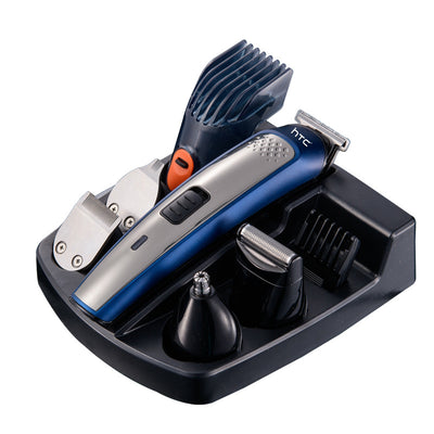 Five-in-one HTC electric hair clipper set with multiple attachments and a black charging stand on a dark background. - Image 5