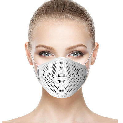 Light blue dust mask with perforated design and central breathing valve, worn by a woman. - Image 5