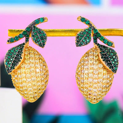 Aretes de Circonita Forma Mango en Oro Cepillado - Image 8