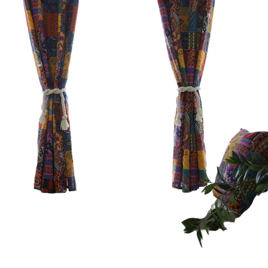Bohemian retro style cotton linen curtains with a vibrant geometric patchwork pattern, one tied back with a rope. - Image 5