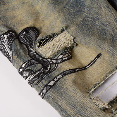 Jeans Slim Fit Desgastados con Bordado de Serpiente de Tres Cabezas y Parches de Cuero - Image 13