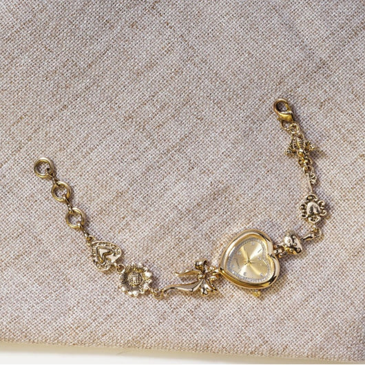 Reloj Pulsera Retro en Forma de Corazón con Diseño de Lazo Dorado y Flores - Image 3