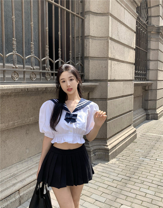 Conjunto Dos Piezas: Blusa Ajustada y Falda Midi Reductora
