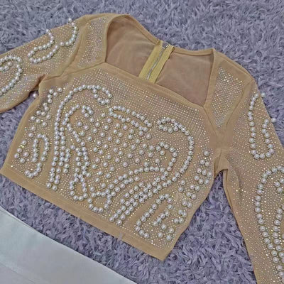 Conjunto Dos Piezas: Blusa Manga Larga con Tachuelas y Falda Midi - Image 19