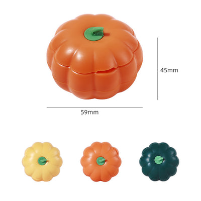 Dark green pumpkin-shaped catnip ball dispenser with a light green stem-like cap for cats. - Image 2