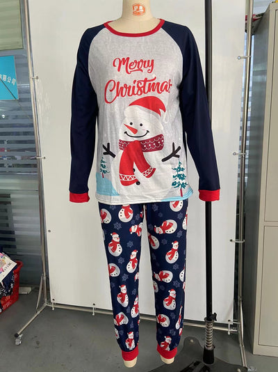 Matching family Christmas pajamas with dark blue long-sleeve tops, light gray fronts, and a snowman graphic. - Image 2