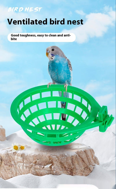 Green plastic bird nest with a grid design and an attached clip, measuring approximately 17.5cm wide. - Image 11