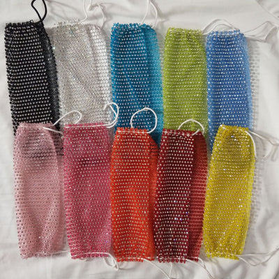 Black fishnet-shaped face mask with star pattern and clear rhinestones, worn by a woman with light brown hair. - Image 3