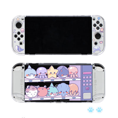 Clear protective case for Nintendo Switch OLED with cute marine animal design, including paw print thumb grips. - Image 4