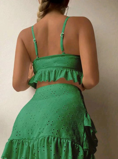 Light blue eyelet two-piece swimsuit set with a tie-front crop top and a matching ruffle-trim hip-hugging skirt. - Image 15
