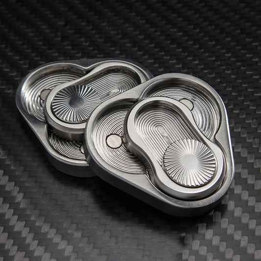 Juguete Antiestrés Giratorio de Acero Inoxidable - Fidget Push Card