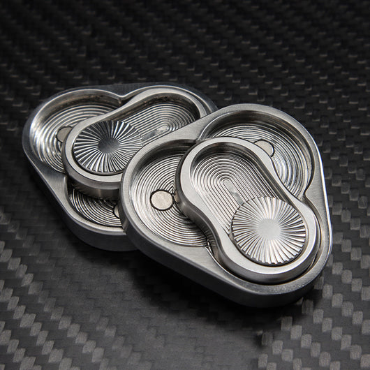 Juguete Antiestrés Giratorio de Acero Inoxidable - Fidget Push Card