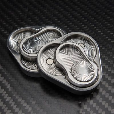 Juguete Antiestrés Giratorio de Acero Inoxidable - Fidget Push Card