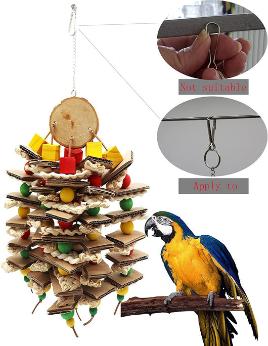 Parrot gnawing toy made of stacked cardboard, corn husks, and colorful wooden beads, with a parrot perched nearby. - Image 4