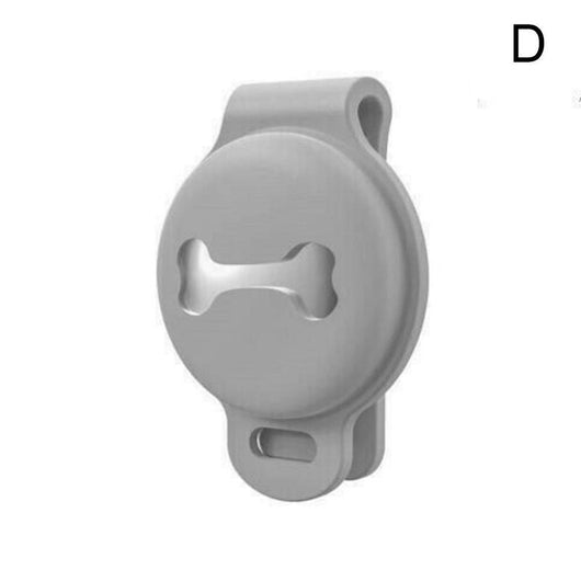 Pink silicone protective cover for a locator tracker, featuring a bone-shaped cutout and an attachment loop. - Image 6