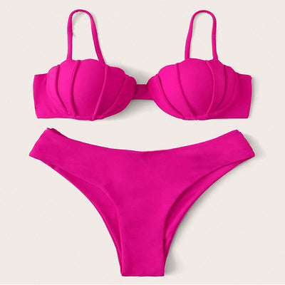 Vibrant blue two-piece bikini with seashell-shaped top and high-cut bottoms, perfect for beach or pool. - Image 6