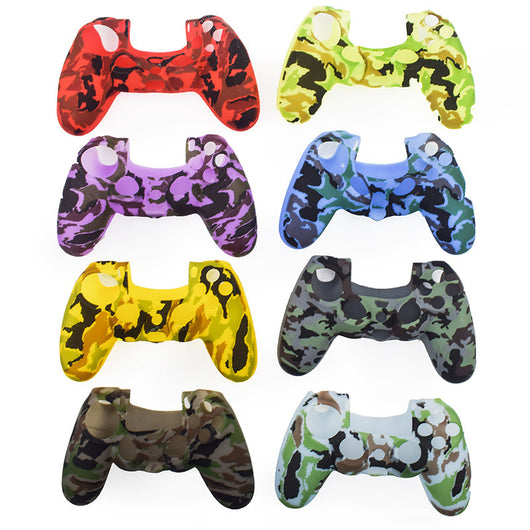 Bright yellow silicone protective cover for a PS4 controller, featuring black buttons and colored action symbols. - Image 4