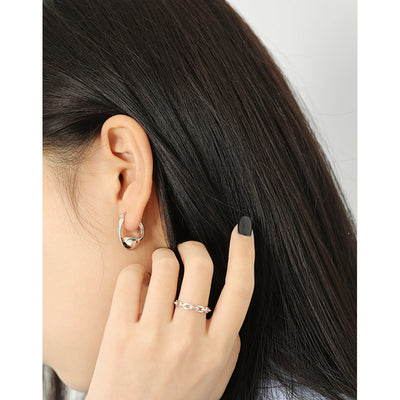 Aretes de plata esterlina con diseño retorcido y acabado brillante - Image 8