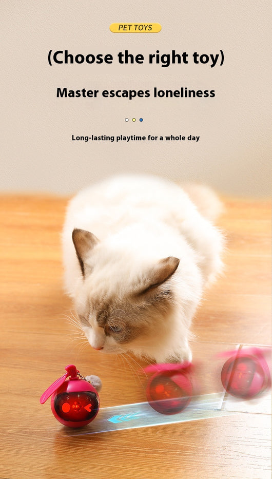 Rose red and black spherical cat toy with a grey pom-pom and suction cup base for self-play. - Image 11