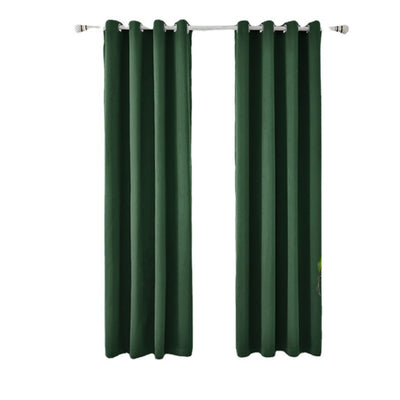 Light gray polyester blackout curtains with grommet tops hanging on a white rod in a modern living room. - Image 4