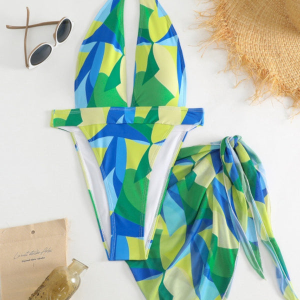 Sexy lace-up backless beach swimwear skirt set with a vibrant blue, green, and yellow geometric print.