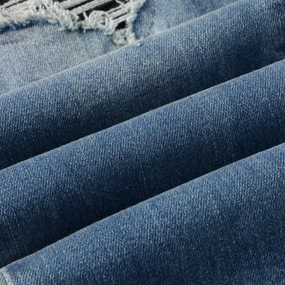 Jeans Vintage Desgastados con Parches de Cuero y Diseño Patchwork para Hombre - Image 23