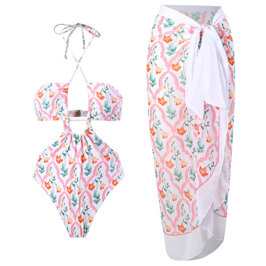 Dark green floral one-piece swimsuit with halter neck, bandeau top, cut-outs, and matching sheer sarong. - Image 5