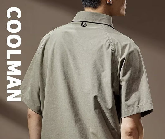 Men's khaki short-sleeve polo shirt with a lapel collar, three buttons, and a large flap chest pocket with a D-ring. - Image 14