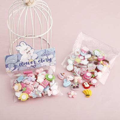 Pack of colorful cartoon plastic stickers featuring cherries, strawberries, flowers, cookies, and rainbows, in a clear bag with a "bunny flower story" header. - Image 7