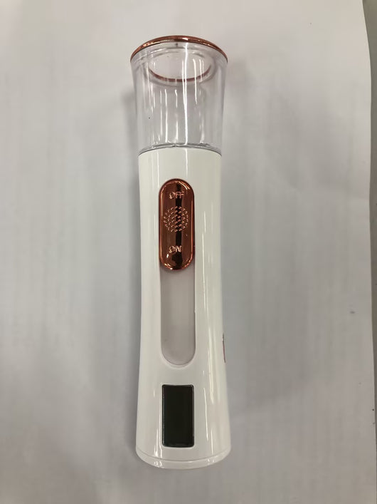 White and rose gold double-spraying nano mist sprayer with a clear reservoir, next to its product box and USB cable. - Image 12