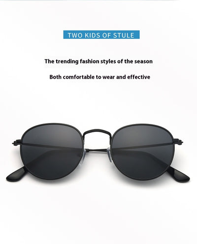 Black metal round frame anti-blue ray glasses with clear lenses, shown at an angle on a white background. - Image 9