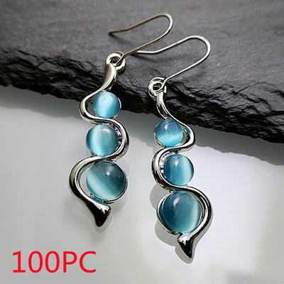 Aretes Ondulados Estilo Bohemio con Gema Ojo de Gato - Image 8