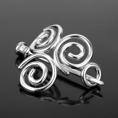 Silver metal hair clip with a retro dragon head and infinity knot design, secured by a plug-in hairpin. - Image 4