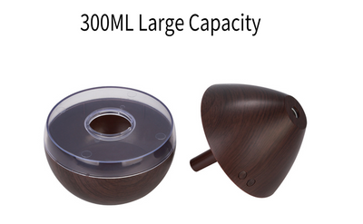 Light wood grain teardrop ultrasonic humidifier and essential oil diffuser with a clear LED light band. - Image 8