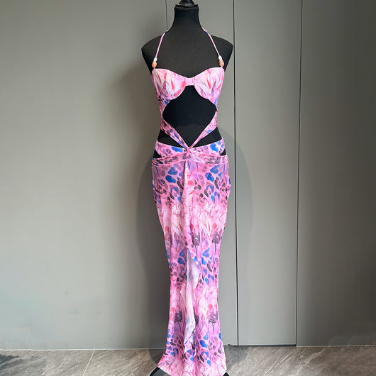 Women's two-piece swimsuit with a halter bikini top and a matching long skirt, featuring a vibrant tropical and animal print. - Image 4